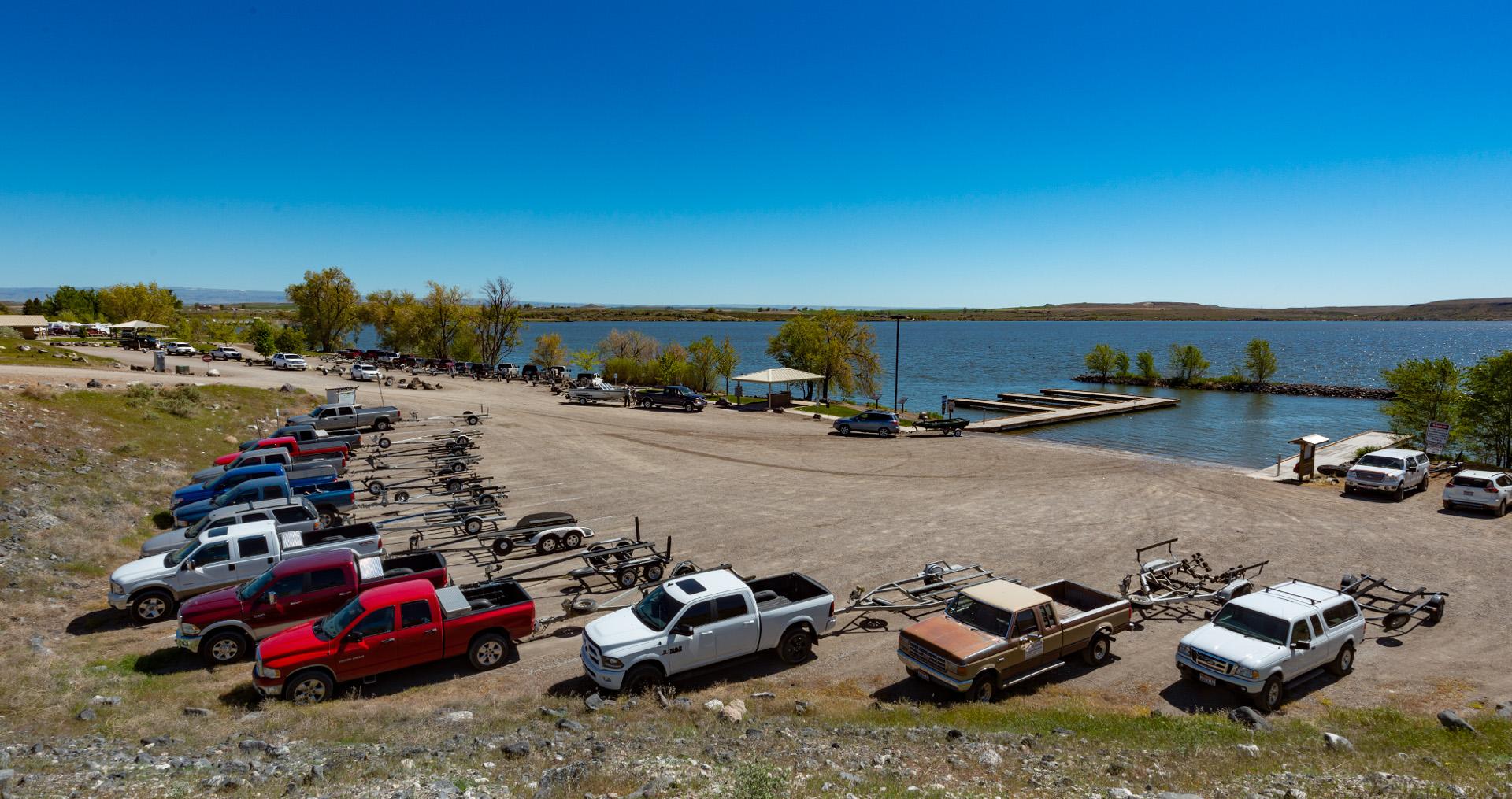trucks and trailers parked at c.j. strike dam boat ramp